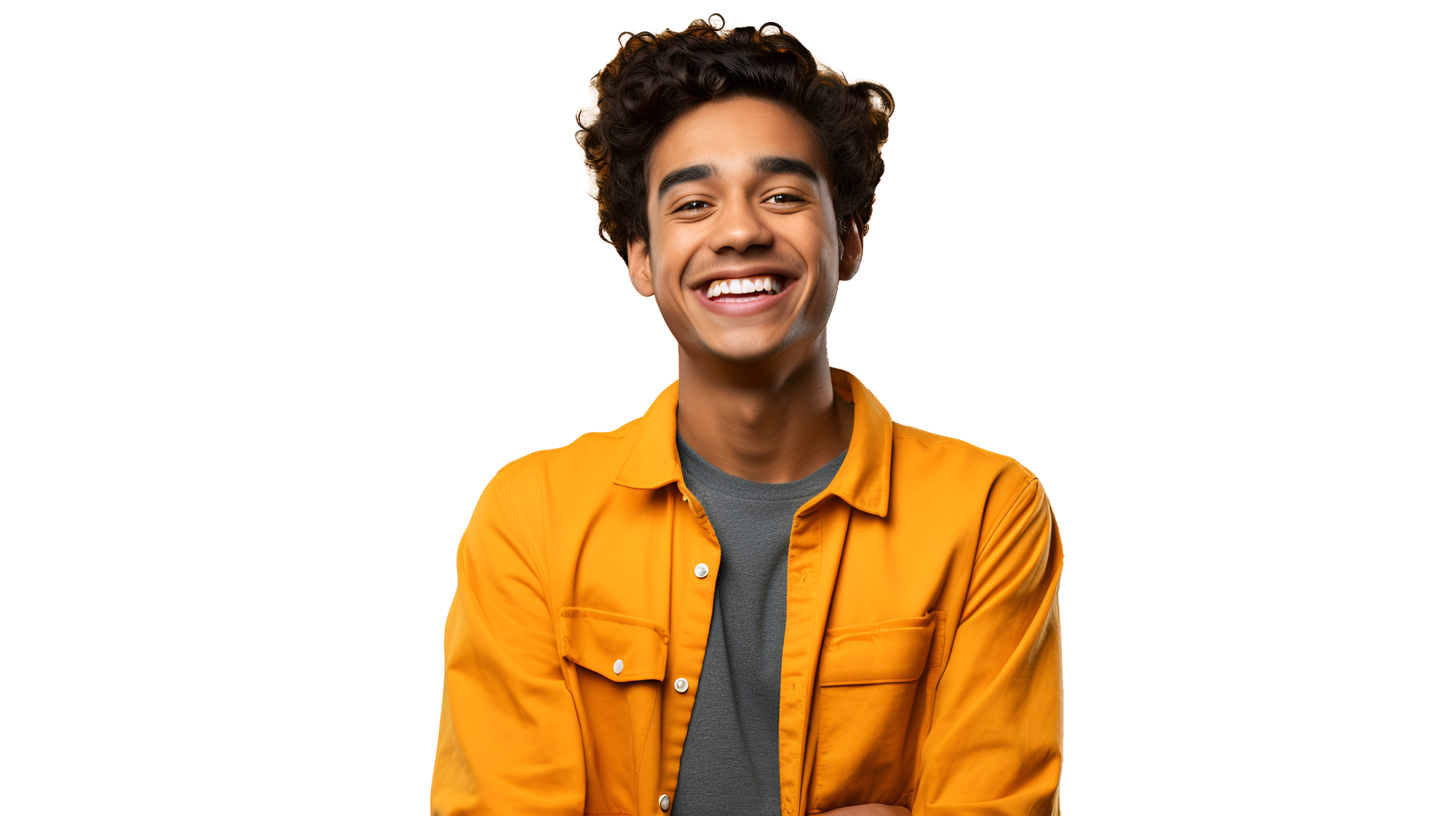 A man with curly hair and yellow shirt smiling.