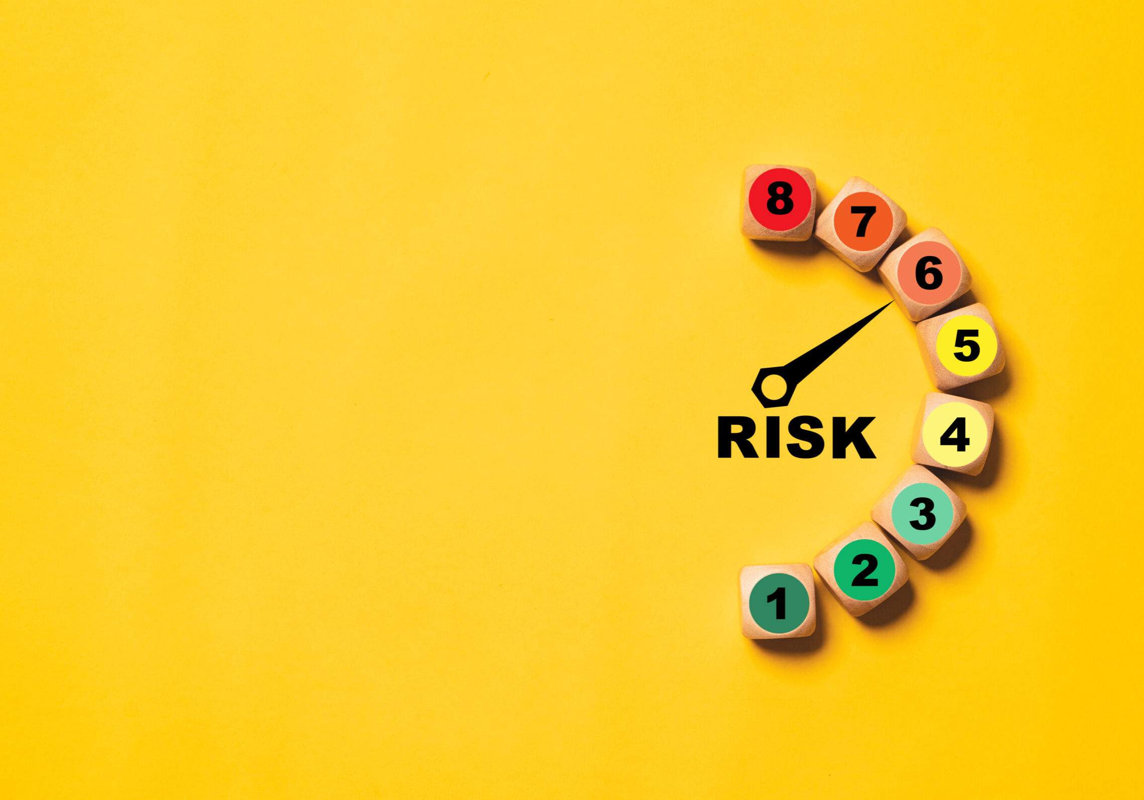 A clock with the word " risk " written on it.